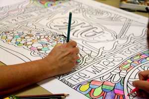 Hand Coloring a Coloring Poster