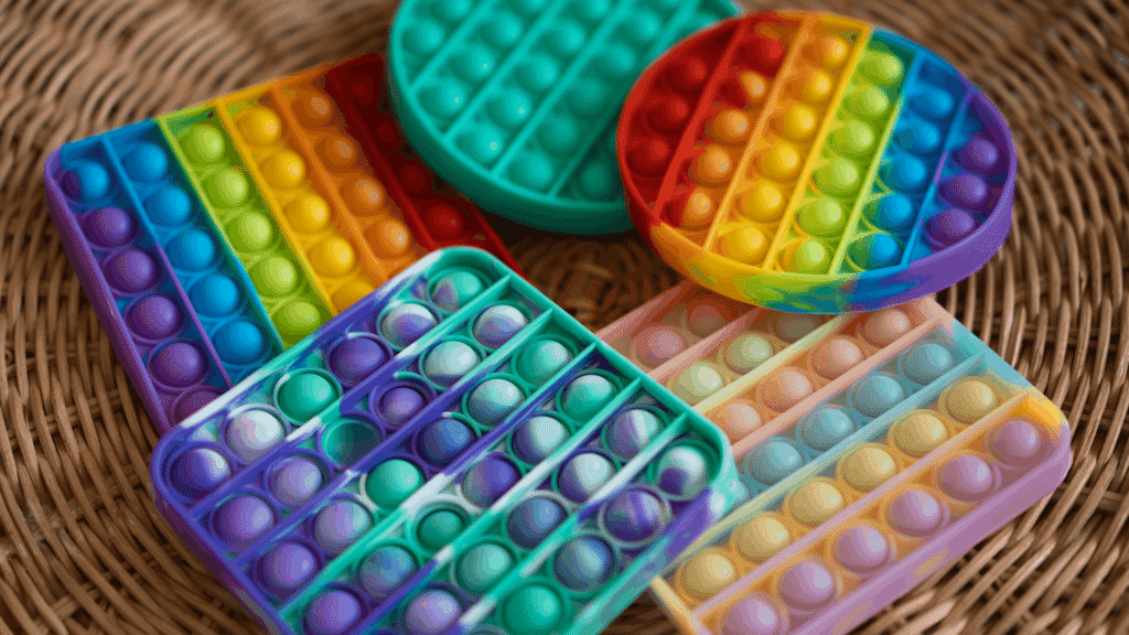 Colorful fidget toys used for sensory support, representing tools for inclusive and accessible worship spaces.