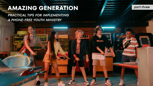Five teenagers laugh, dance, and spend time together in an arcade surrounded by vintage arcade games and colorful lights.